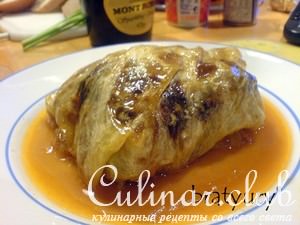 Куриные бедрышки, запечённые в листьях квашеной капусты