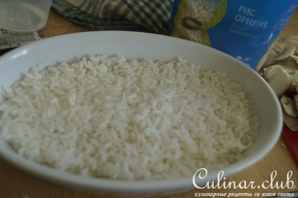 Рис под сливочной шапкой из курицы и шампиньонов
