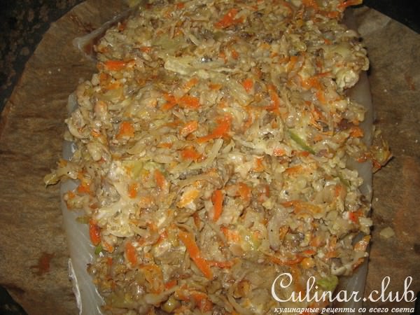 Рыба запеченная под грибным соусом.