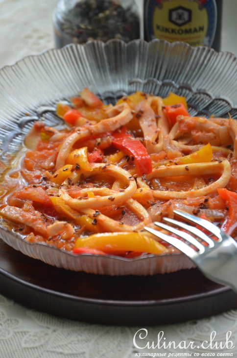 Кальмары,тушенные с перцем и кунжутом