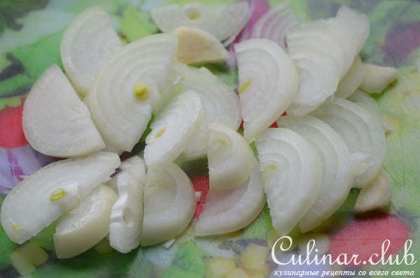 Кальмары,тушенные с перцем и кунжутом