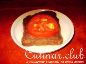 Fry egg in a black bread.     