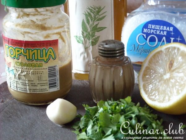 Маринованные кальмары с лимонной заправкой.